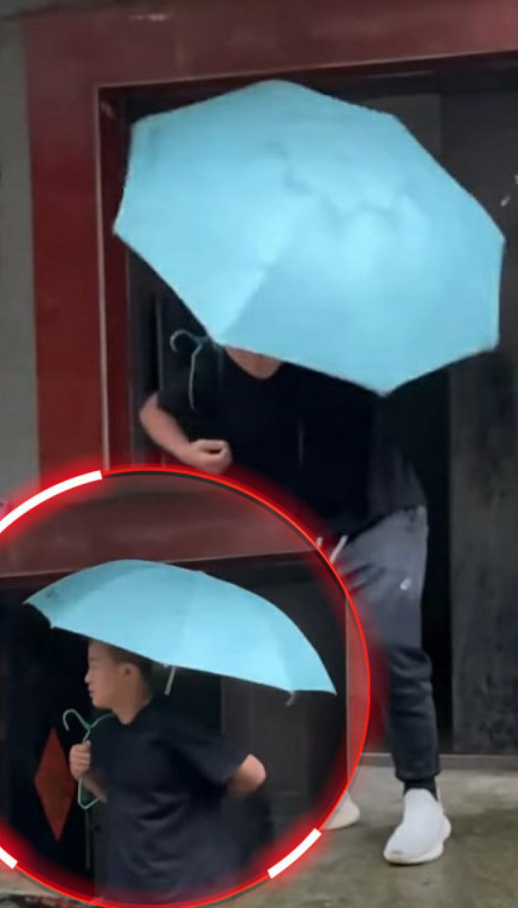 LUDOST ILI GENIJALNOST: Kako se muškarac brani od kiše VIDEO